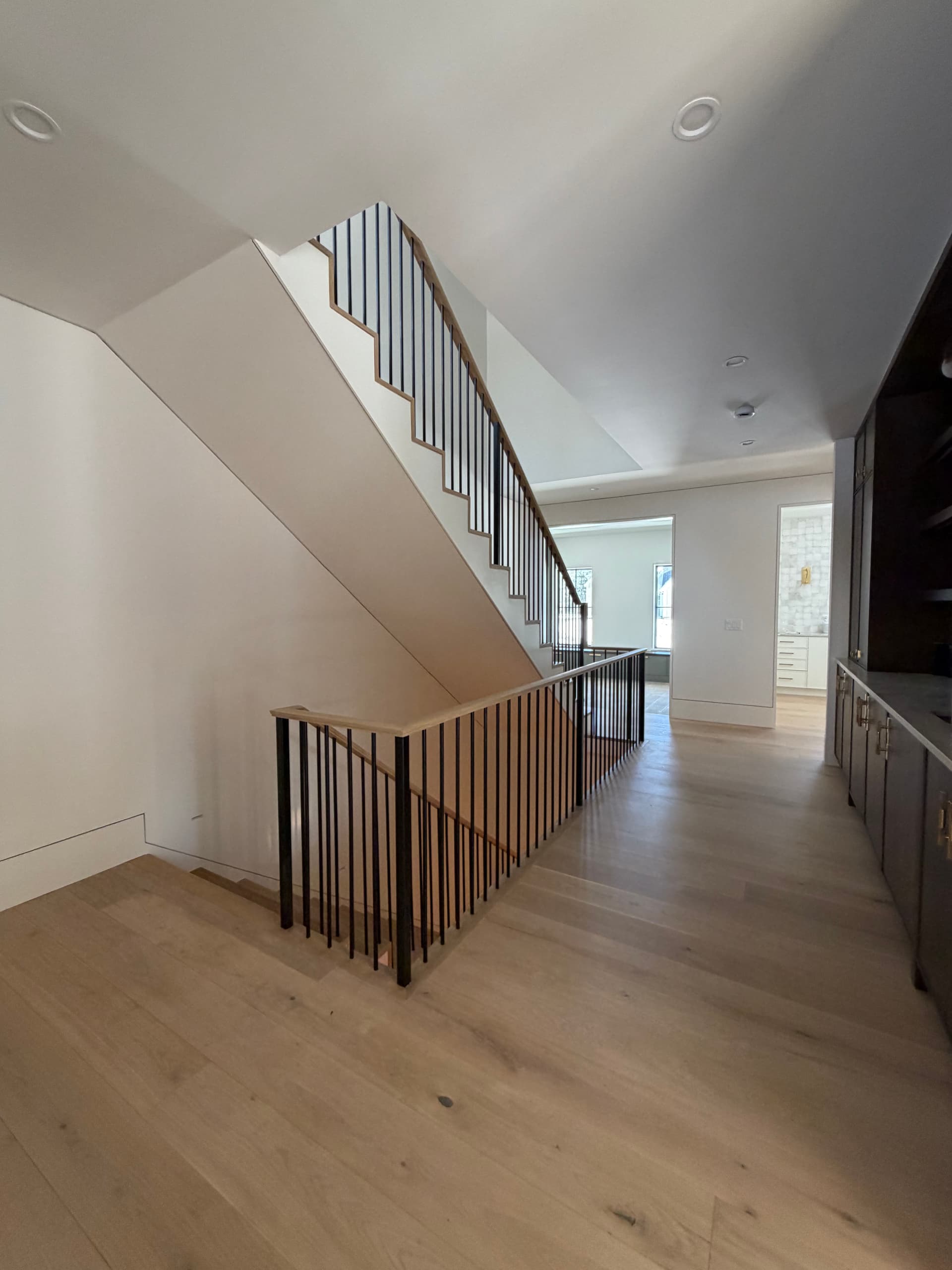 Seamless Stairway Upgrade with Wood and Metal Elegance