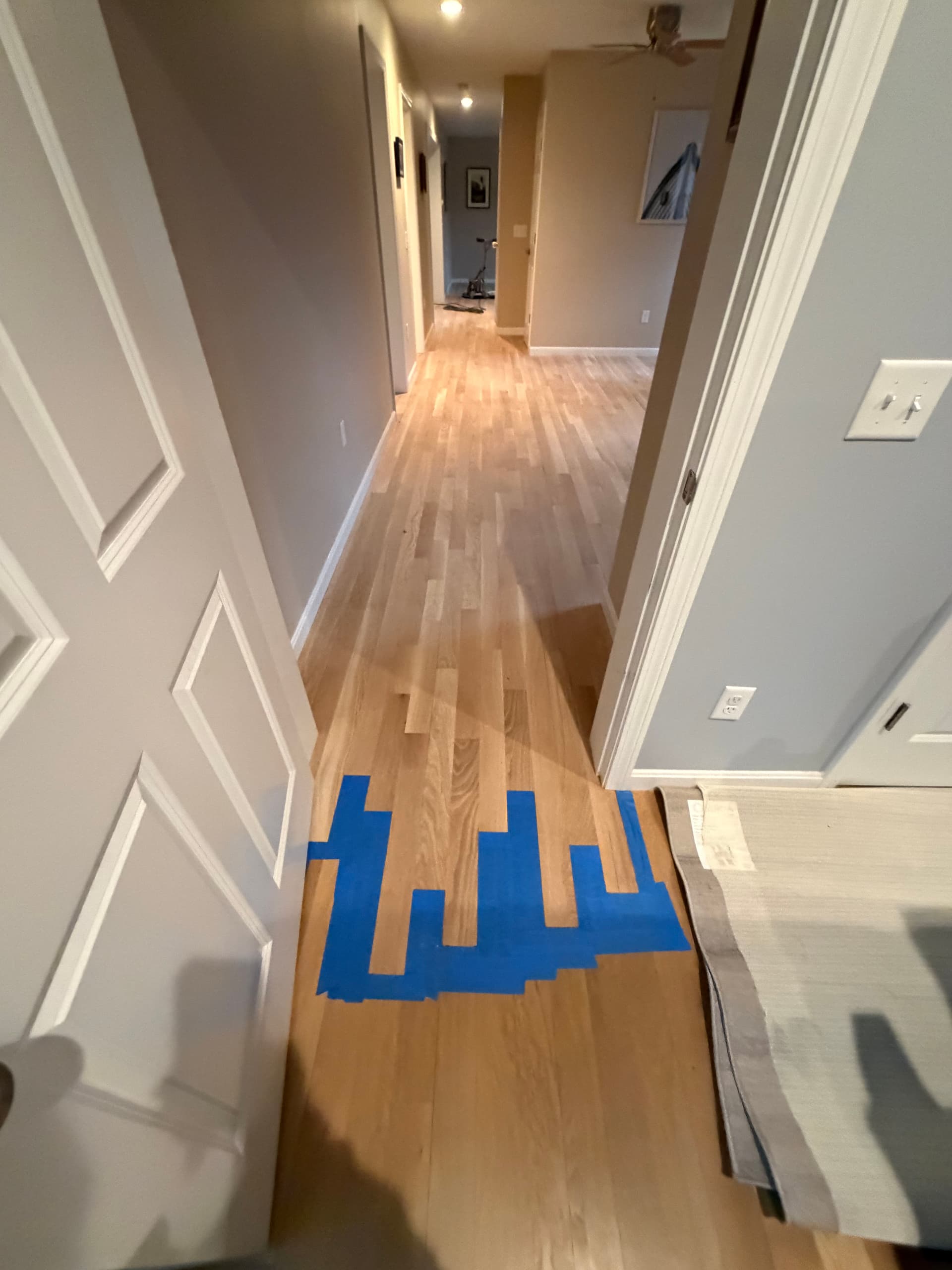 Stunning Hardwood Floor Refinishing in a Cozy Home image